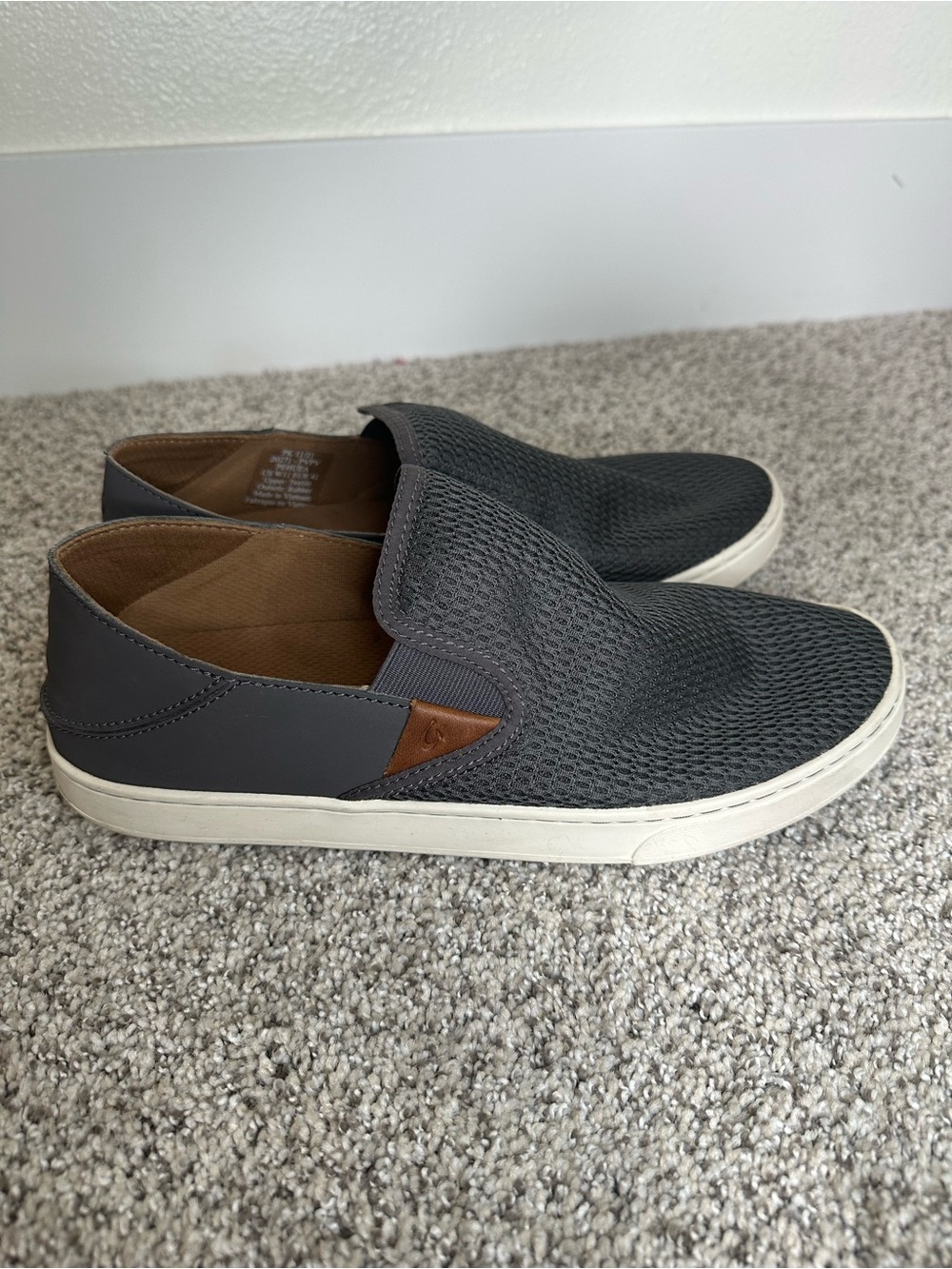 OluKai Women’s Slip-On Sneakers in Charcoal with White Sole